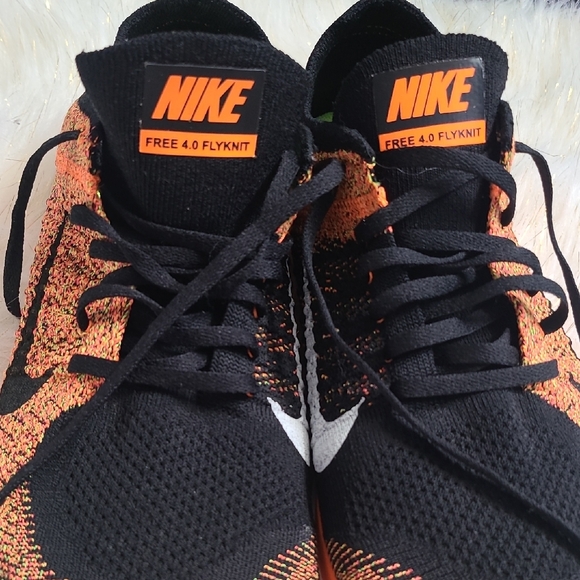 Nike Black and Orange Dynamic Sneakers - Picture 12 of 13